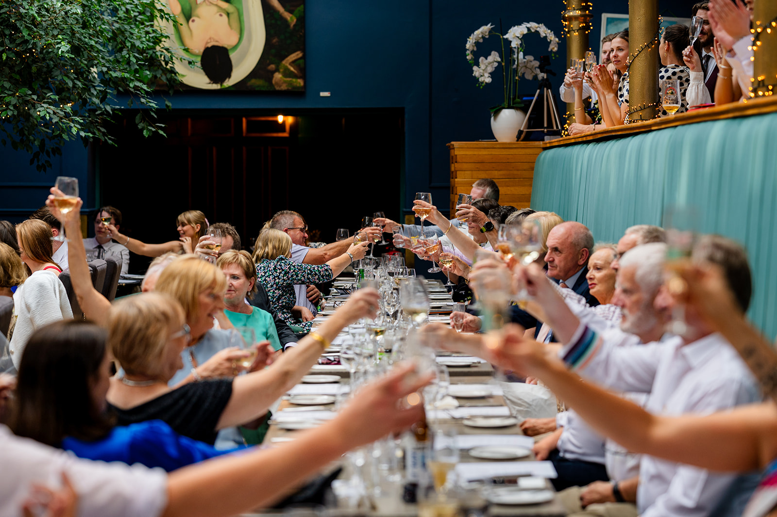 Wedding guests raising a toast